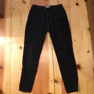 Stretchy black denim skinny jeans